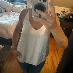 Satin top with pearl detail!